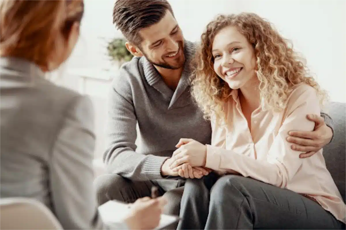 Couples counsellor in Perth guiding two partners through first session goals, ground rules and a brief communication exercise in a calm therapy room